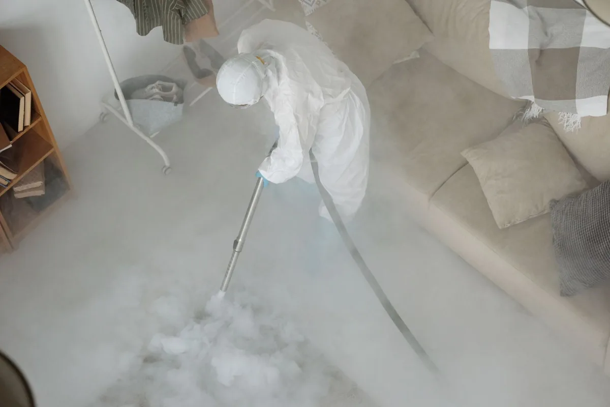 Biohazard cleanup technician in protective equipment, Byrdstown, TN